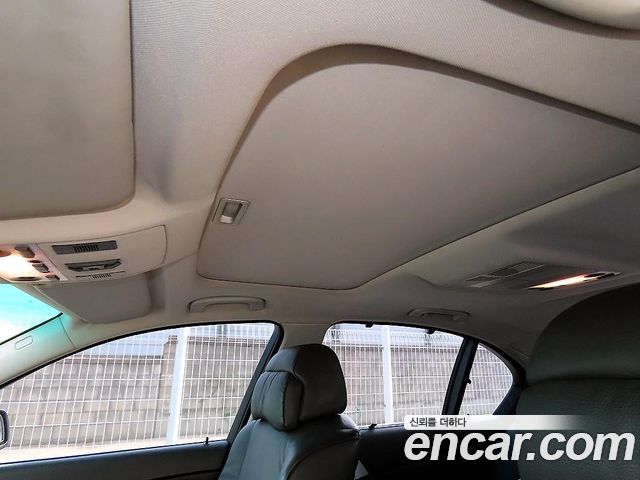 BMW 5-Series 2004 — photo 17