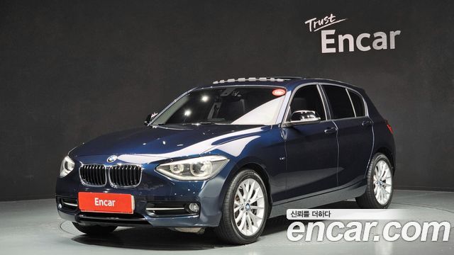 BMW 1-Series 2015 — photo 1