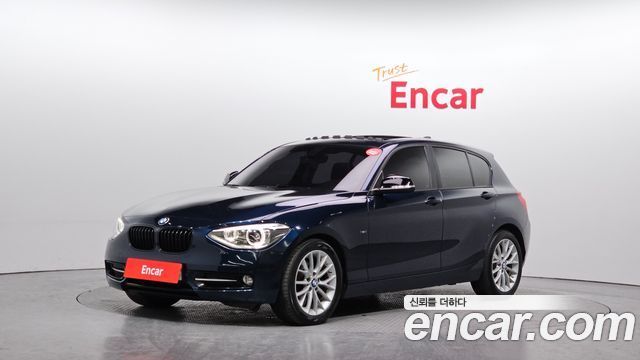 BMW 1-Series 2015 — photo 1