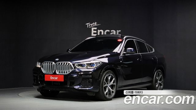 BMW X6 2023 — photo 1