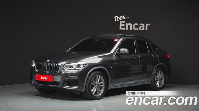 BMW X4 2021 — photo 1