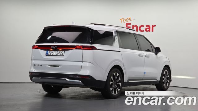 Kia Canival 2021 — photo 2