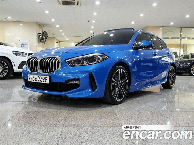 BMW 1-Series 2023 — photo 1