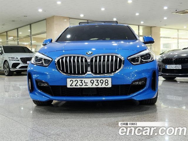 BMW 1-Series 2023 — photo 2