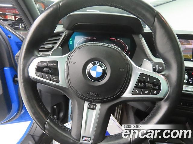 BMW 1-Series 2023 — photo 7