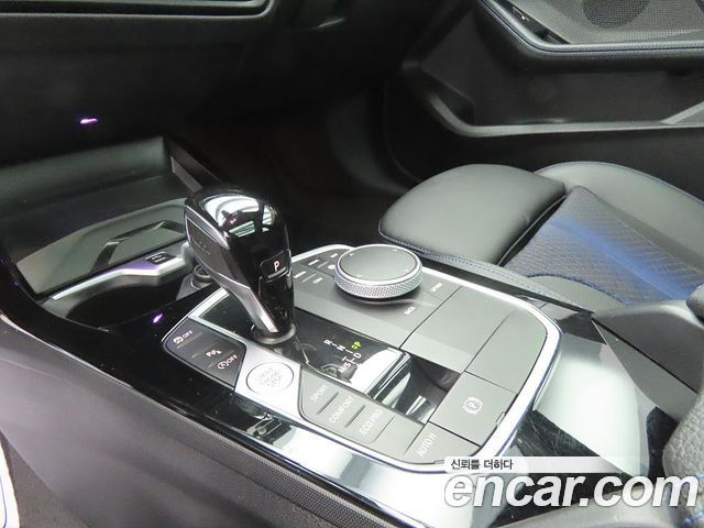 BMW 1-Series 2023 — photo 10
