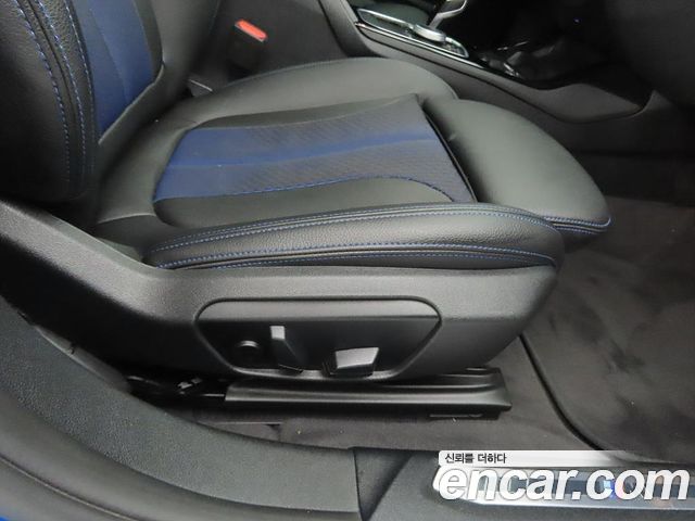 BMW 1-Series 2023 — photo 15