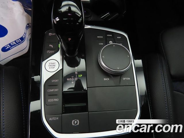 BMW 1-Series 2023 — photo 16
