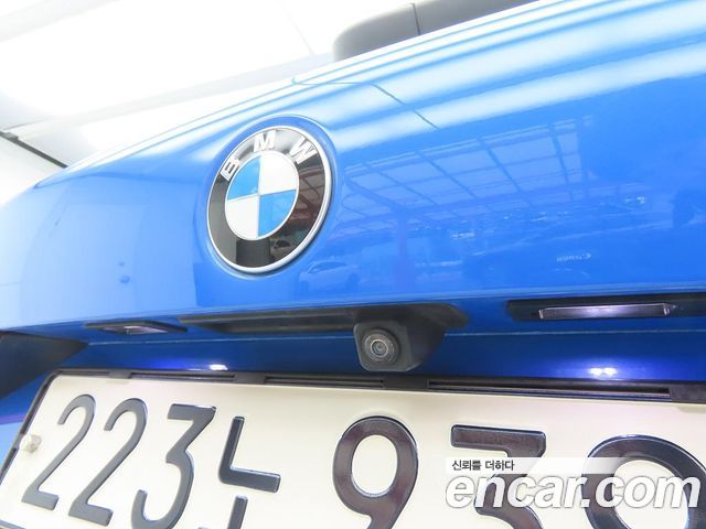 BMW 1-Series 2023 — photo 17
