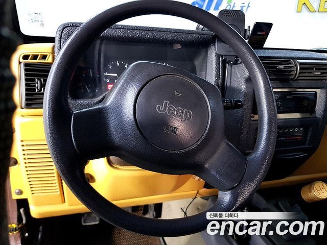 Jeep Wrangler 1997 — photo 13