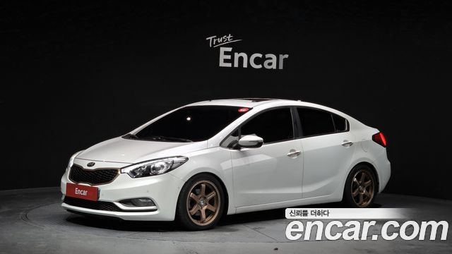 Kia K3 2015 — photo 1