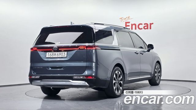 Kia Canival 2021 — photo 2