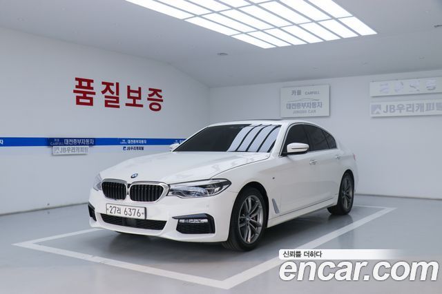 BMW 5-Series 2018 — photo 1