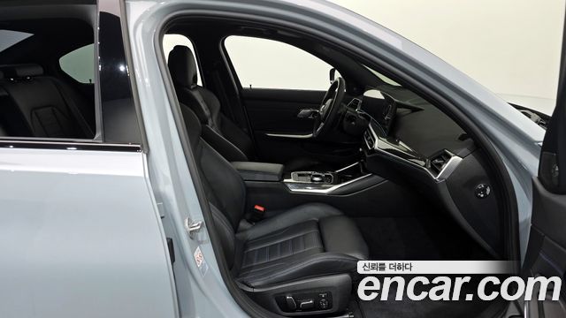 BMW 3-Series 2024 — photo 11