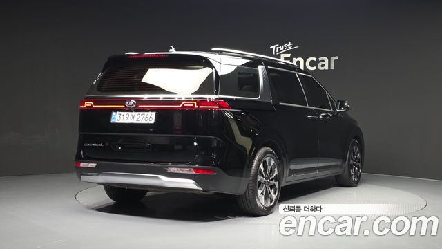 Kia Canival 2021 — photo 2