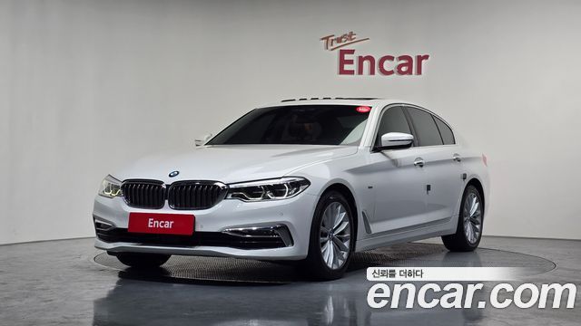 BMW 5-Series 2018 — photo 1