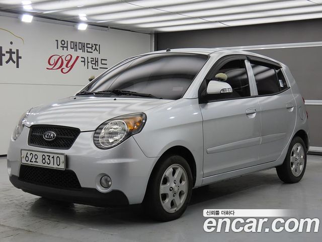 Kia morning 2009 — photo 1