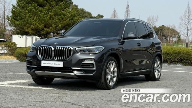 BMW X5 2021 — photo 1
