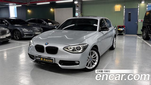 BMW 1-Series 2015 — photo 1