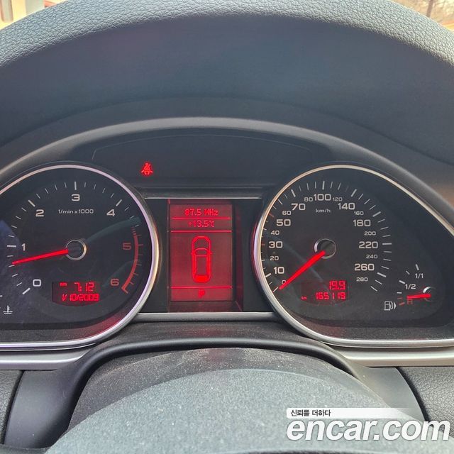 Audi Q7 2010 — photo 17