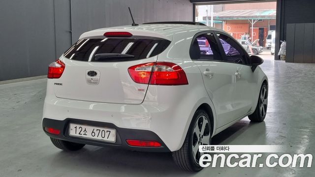Kia pride 2012 — photo 2