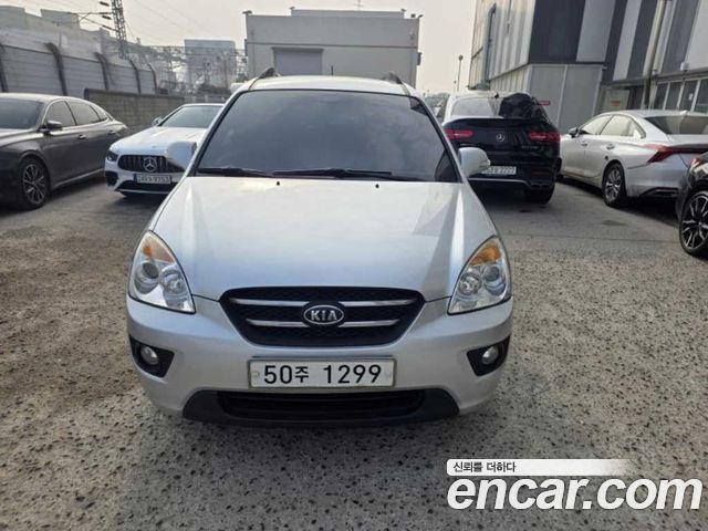 Kia Carens 2010 — photo 2