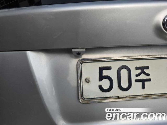 Kia Carens 2010 — photo 4