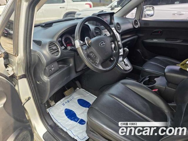 Kia Carens 2010 — photo 6