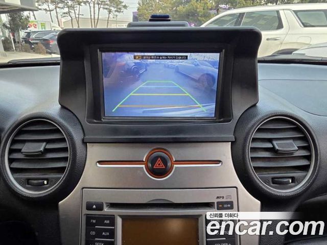 Kia Carens 2010 — photo 10