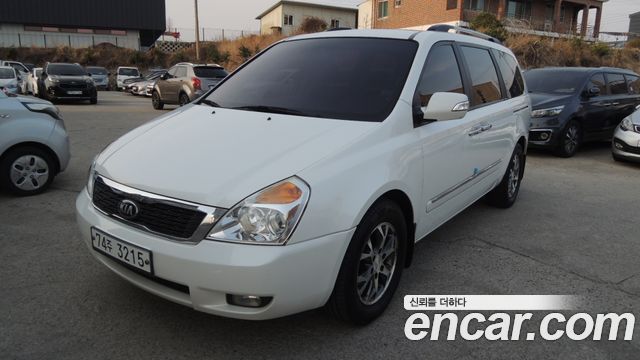 Kia Canival 2014 — photo 1