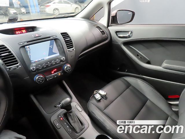 Kia K3 2013 — photo 11