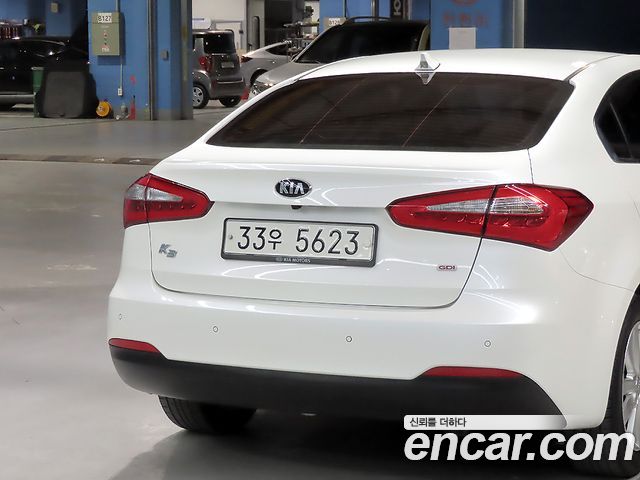 Kia K3 2013 — photo 17