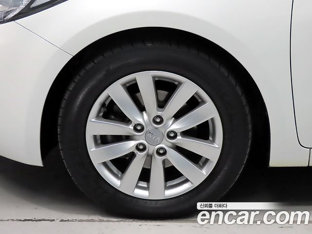Kia K3 2013 — photo 19