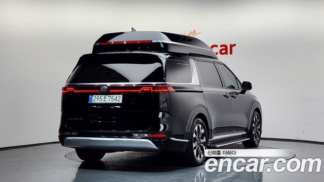 Kia Canival 2021 — photo 2