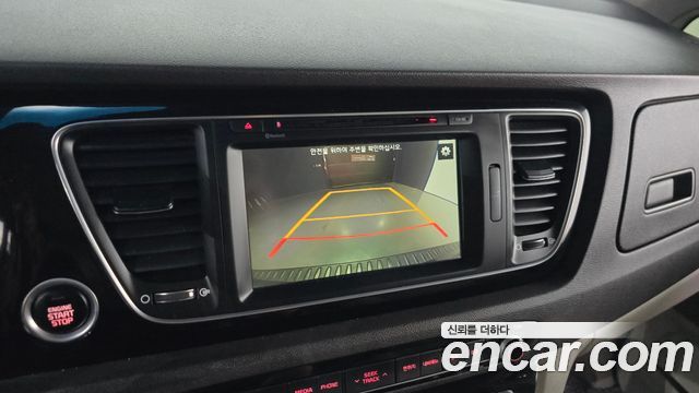 Kia Canival 2015 — photo 20