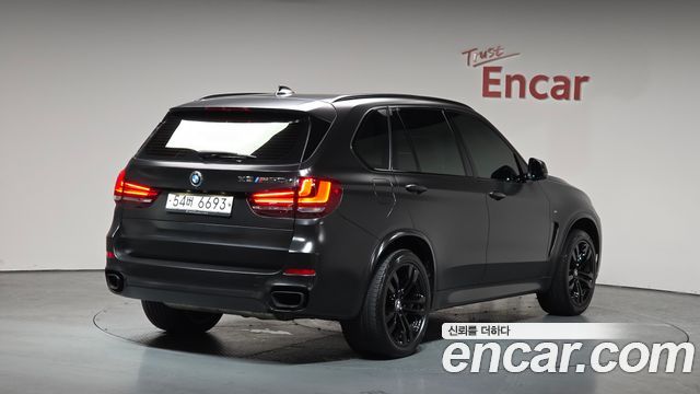 BMW X5 2014 — photo 2