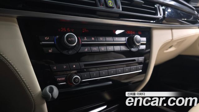 BMW X5 2014 — photo 25