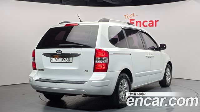 Kia Canival 2013 — photo 2