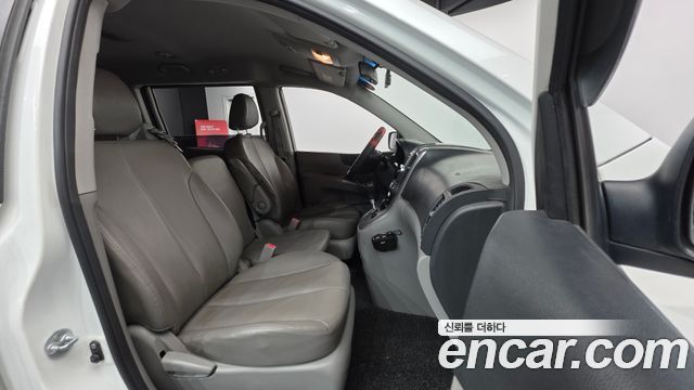 Kia Canival 2013 — photo 10