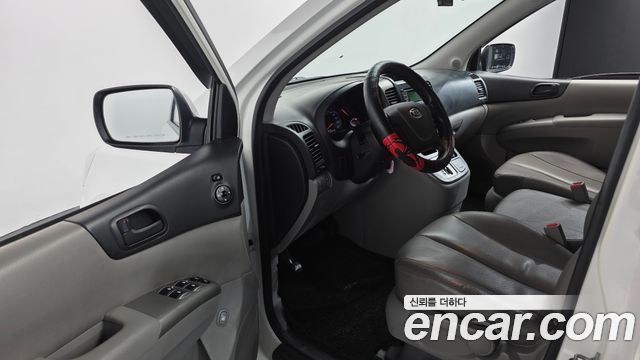 Kia Canival 2013 — photo 11