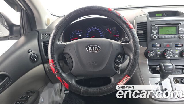 Kia Canival 2013 — photo 14