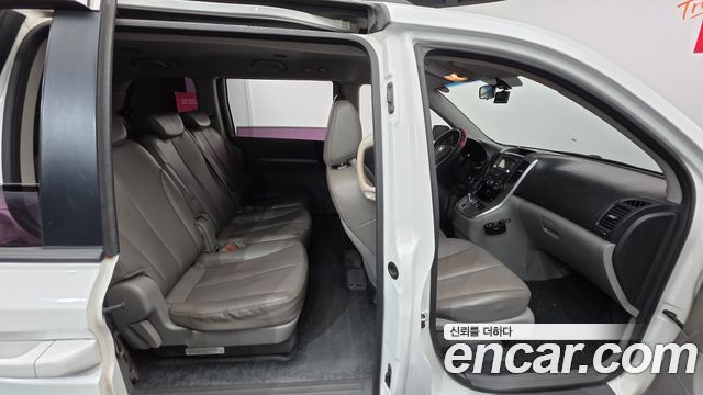 Kia Canival 2013 — photo 19