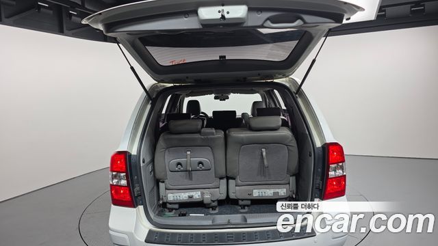 Kia Canival 2013 — photo 20