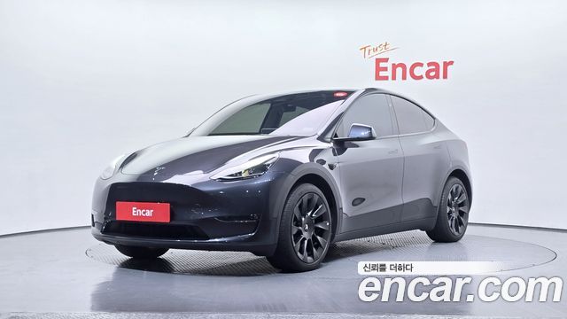 Tesla Model Y 2024 — photo 1
