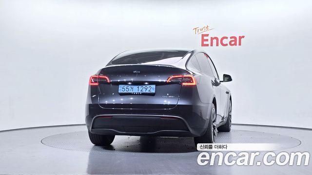 Tesla Model Y 2024 — photo 4