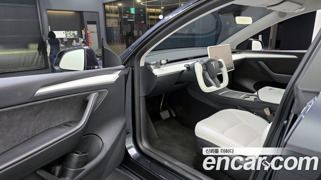 Tesla Model Y 2024 — photo 10