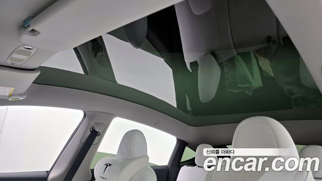 Tesla Model Y 2024 — photo 19
