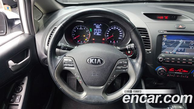 Kia K3 2015 — photo 14
