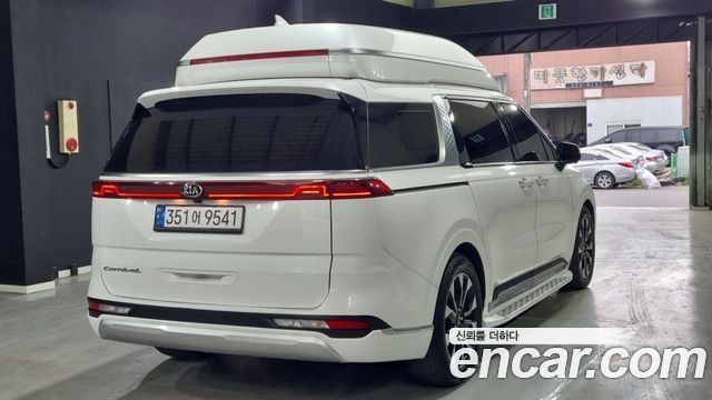 Kia Canival 2021 — photo 2