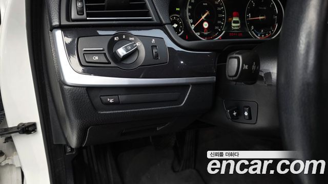 BMW 5-Series 2014 — photo 18